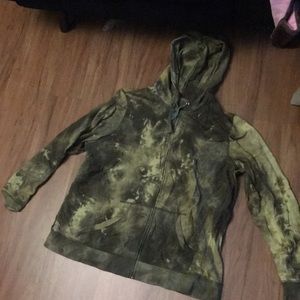 Army green zip up jacket.